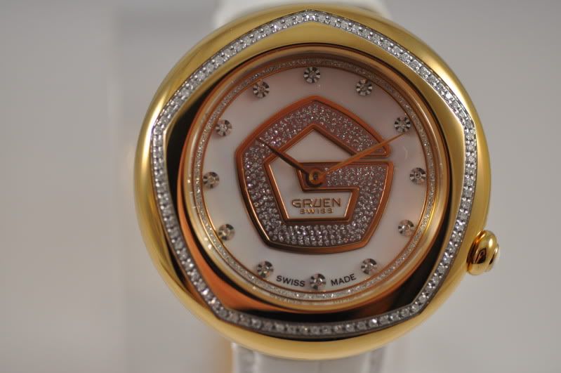   SWISS OVER 85 GENUINE DIAMONDS MOTHER PEARL DIAL LOGO WATCH  